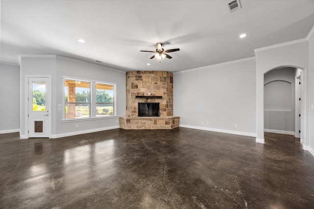 2730 Bryson Rd, Mansfield, TX 76063 - unfurnished living room with a ceiling fan, arched walkways, concrete floors, ornamental molding, and a stone fireplace
