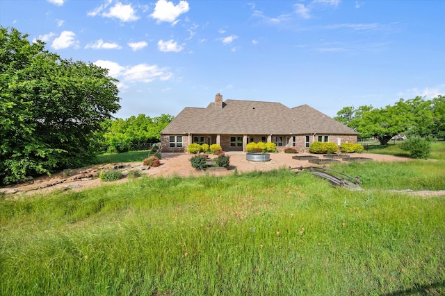2730 Bryson Rd, Mansfield, TX 76063 - back of property featuring a chimney