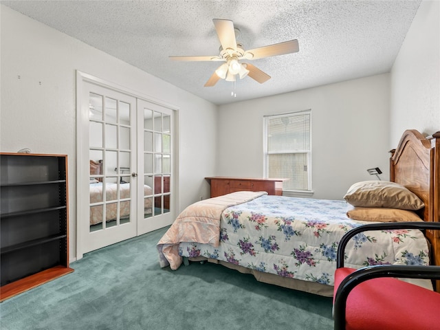 bedroom featuring french doors, carpet flooring, a textured ceiling, and ceiling fan