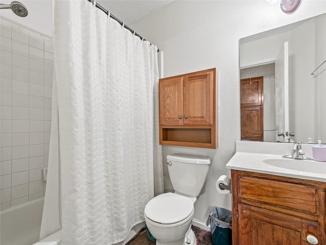 bathroom featuring toilet, vanity, and shower / bath combo