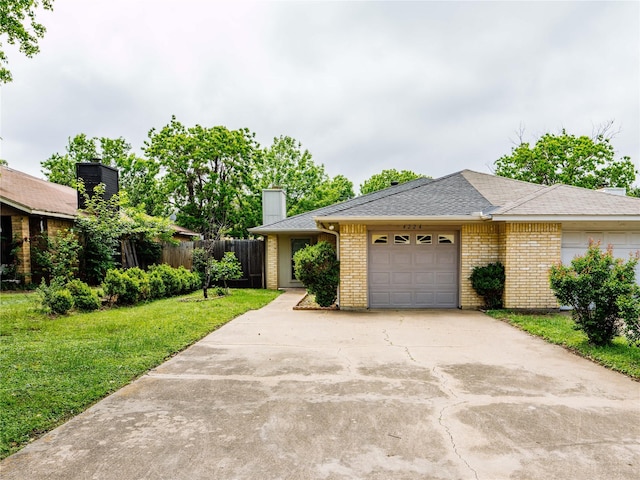 single story home featuring an attached garage, concrete driveway, brick siding, a chimney, and a shingled roof