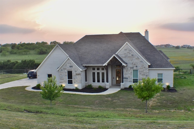 145 Overlook Dr, Aledo, TX 76008 - french provincial home with stone siding, a chimney, and a lawn