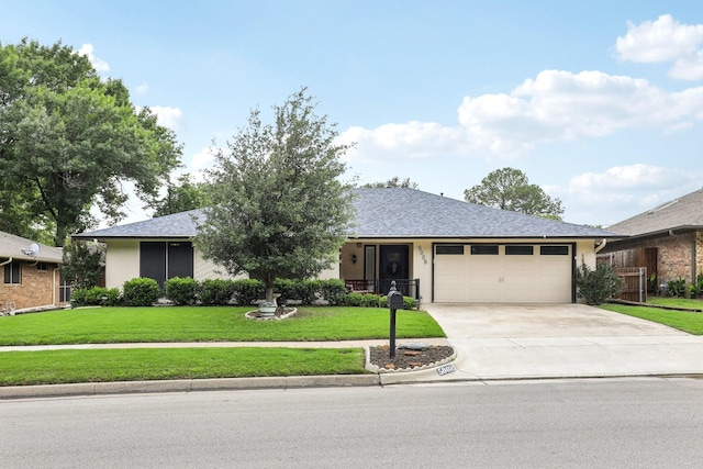 5008 Caliente Dr, Arlington, TX 76017 - single story home with a garage, a front lawn, driveway, and roof with shingles