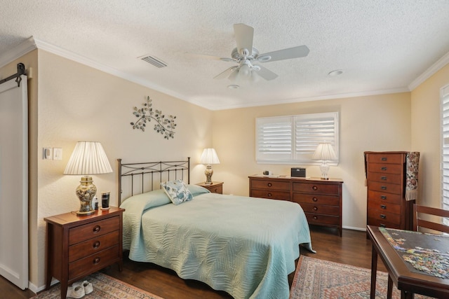 5008 Caliente Dr, Arlington, TX 76017 - bedroom featuring wood finished floors, a textured ceiling, ornamental molding, baseboards, and ceiling fan