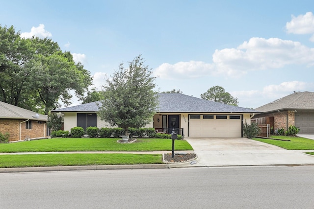 5008 Caliente Dr, Arlington, TX 76017 - ranch-style home with a garage, driveway, a front lawn, and stucco siding