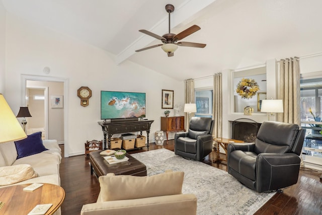 5008 Caliente Dr, Arlington, TX 76017 - living room with beamed ceiling, wood finished floors, a ceiling fan, and high vaulted ceiling