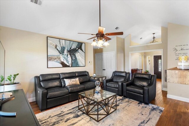 2098 Amber Ct, Lewisville, TX 75067 - living room with ceiling fan, baseboards, hardwood / wood-style flooring, and high vaulted ceiling