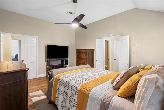 2098 Amber Ct, Lewisville, TX 75067 - bedroom featuring wood finished floors, lofted ceiling, and ceiling fan
