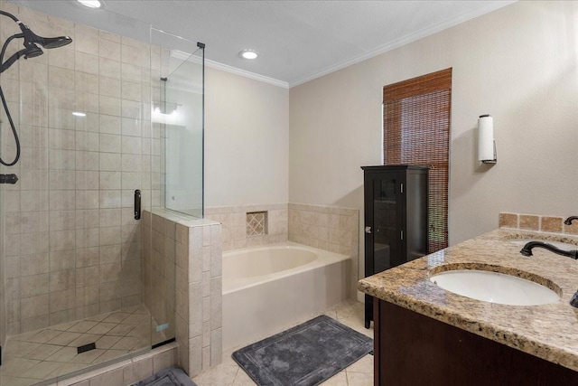 2098 Amber Ct, Lewisville, TX 75067 - bathroom with a stall shower, ornamental molding, a bath, double vanity, and tile patterned floors