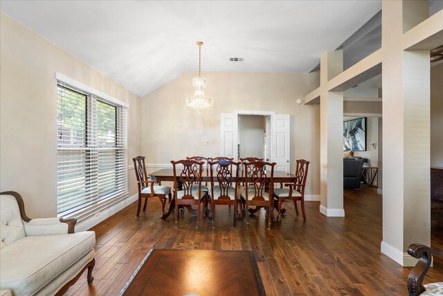2098 Amber Ct, Lewisville, TX 75067 - dining space with vaulted ceiling, a chandelier, dark wood finished floors, and baseboards