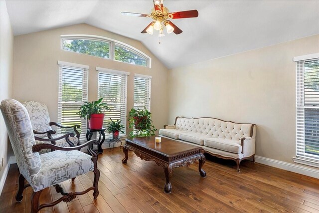 2098 Amber Ct, Lewisville, TX 75067 - sitting room featuring plenty of natural light, a ceiling fan, vaulted ceiling, hardwood / wood-style floors, and baseboards