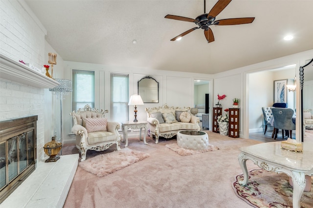 1513 Silverleaf Dr, Carrollton, TX 75007 - living area with lofted ceiling, ceiling fan, a brick fireplace, and carpet
