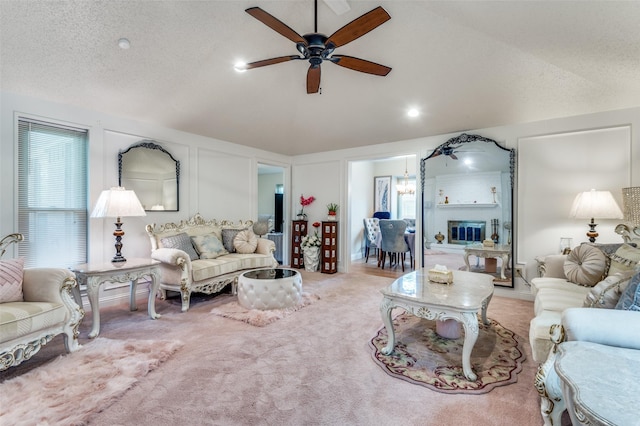 1513 Silverleaf Dr, Carrollton, TX 75007 - carpeted living area with vaulted ceiling, a ceiling fan, and healthy amount of natural light