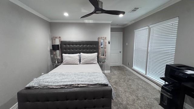 bedroom with carpet, ornamental molding, baseboards, ceiling fan, and recessed lighting
