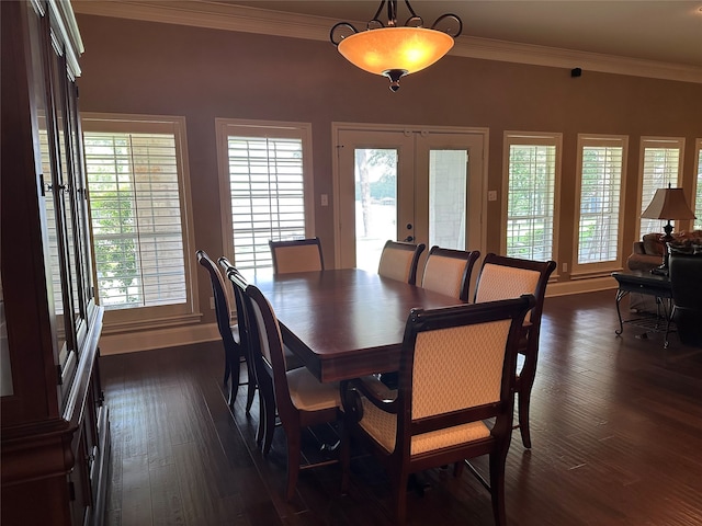 23196 J E B Cir, Frankston, TX 75763 - dining space with crown molding, french doors, dark wood finished floors, and baseboards