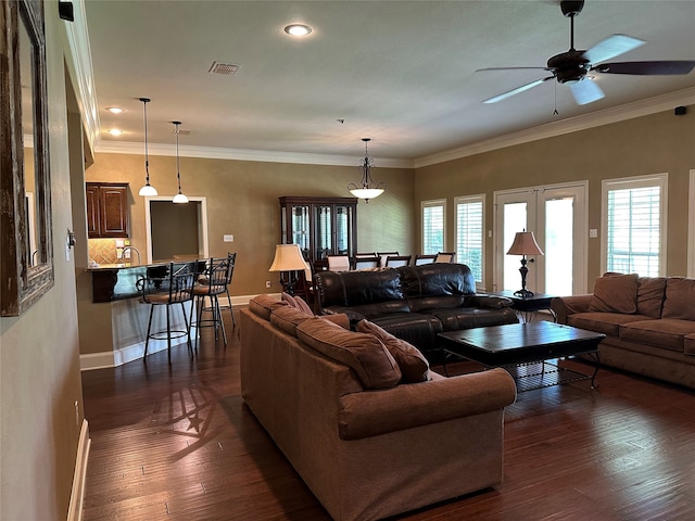 23196 J E B Cir, Frankston, TX 75763 - living room featuring dark wood-type flooring, ceiling fan, baseboards, recessed lighting, and ornamental molding