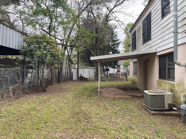 view of yard featuring central AC unit