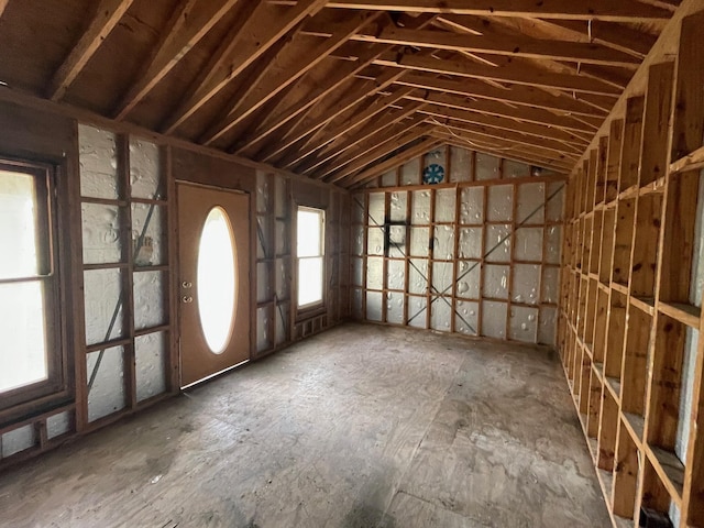 miscellaneous room featuring lofted ceiling