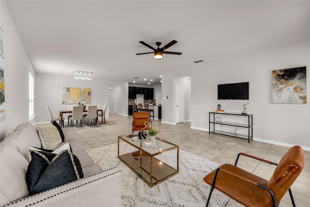 3433 Alamosa River Dr, Celina, TX 75078 - living area with light tile patterned floors, a ceiling fan, baseboards, and recessed lighting