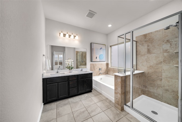 3433 Alamosa River Dr, Celina, TX 75078 - bathroom with a stall shower, a garden tub, tile patterned flooring, double vanity, and recessed lighting