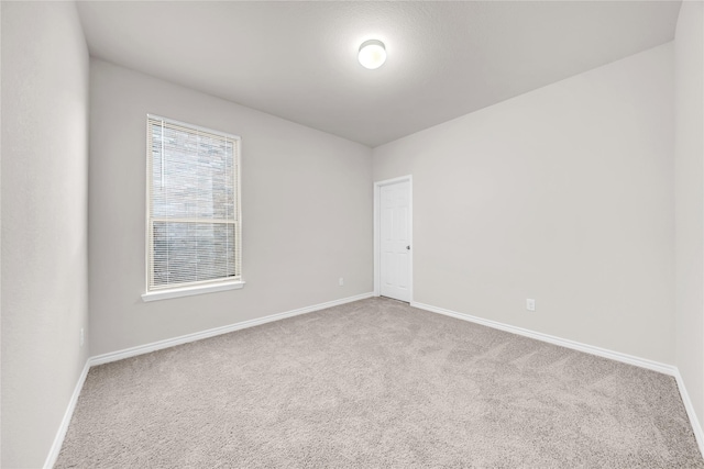 3433 Alamosa River Dr, Celina, TX 75078 - carpeted empty room featuring baseboards