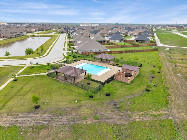 3433 Alamosa River Dr, Celina, TX 75078 - aerial perspective of suburban area featuring a pool and a large body of water