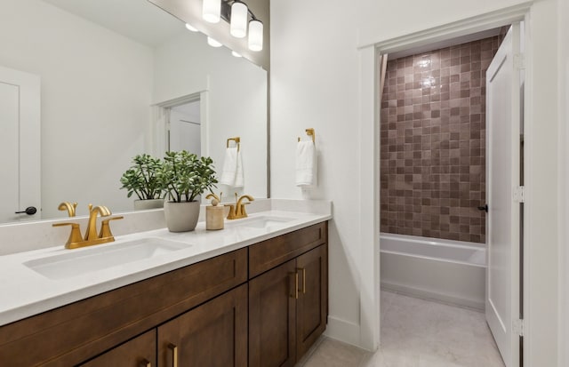 2824 Tophill Dr, Celina, TX 75009 - full bath featuring double vanity, tile patterned floors, and shower / washtub combination