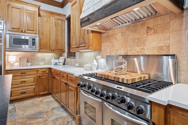4290 Castle Bank Ln, Frisco, TX 75033 - kitchen featuring custom range hood, stainless steel appliances, light stone finish floors, decorative backsplash, and ornamental molding