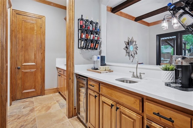 4290 Castle Bank Ln, Frisco, TX 75033 - kitchen with a sink, wine cooler, ornamental molding, light countertops, and beam ceiling