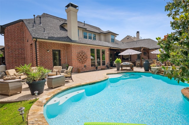 4290 Castle Bank Ln, Frisco, TX 75033 - swimming pool featuring a patio area and an outdoor living space