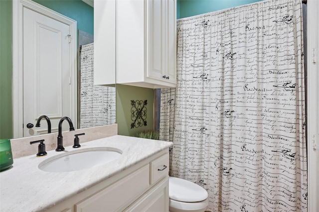 4290 Castle Bank Ln, Frisco, TX 75033 - bathroom with toilet, vanity, and curtained shower