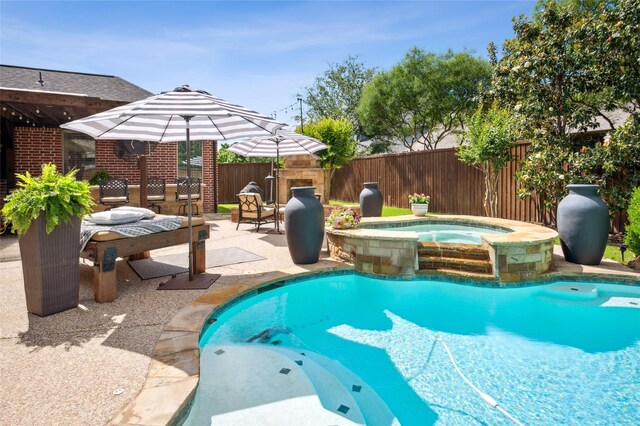 4290 Castle Bank Ln, Frisco, TX 75033 - view of pool featuring a patio, fence, and a pool with connected hot tub