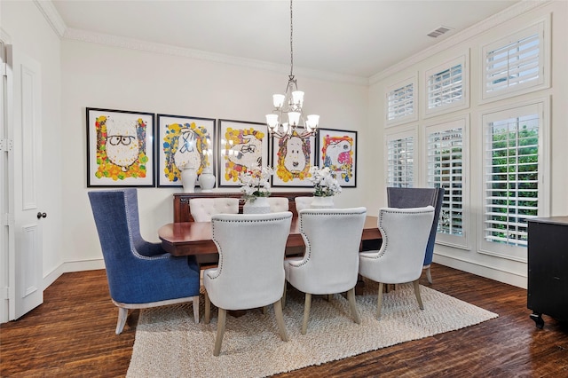 4290 Castle Bank Ln, Frisco, TX 75033 - dining area featuring a chandelier, wood finished floors, crown molding, and baseboards