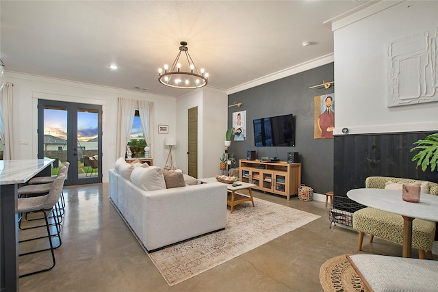 living area with concrete flooring, a chandelier, crown molding, french doors, and recessed lighting