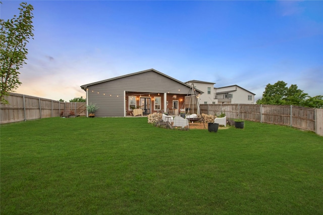 rear view of property with a patio area