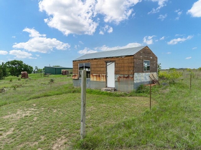 view of outbuilding with an outbuilding