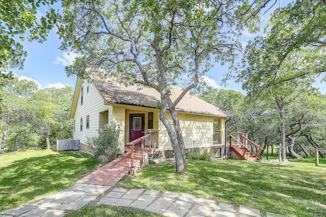 41 Crestline Ct, Nocona, TX 76255 - view of front of property with a front lawn and a shingled roof