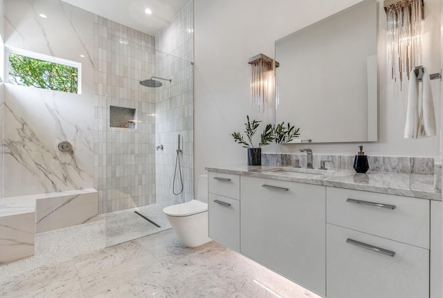 bathroom featuring toilet, vanity, walk in shower, marble tiled floors, and recessed lighting