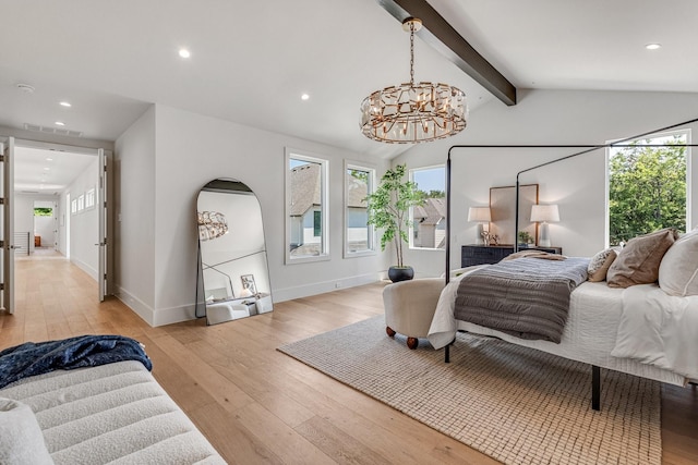 bedroom with multiple windows, a chandelier, light wood finished floors, and recessed lighting