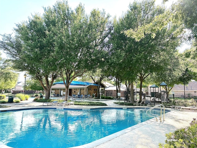 1707 Wheatberry Ln, Allen, TX 75002 - community pool featuring fence and a patio