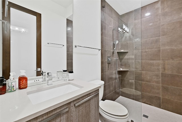 5160 Statesman Ln, Frisco, TX 75036 - bathroom featuring toilet, walk in shower, and vanity