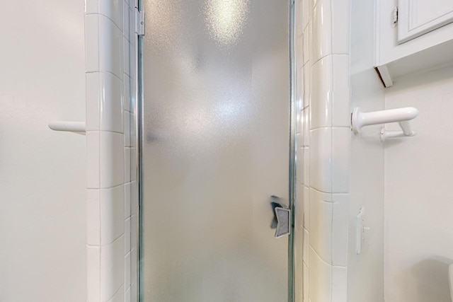 bathroom featuring a stall shower