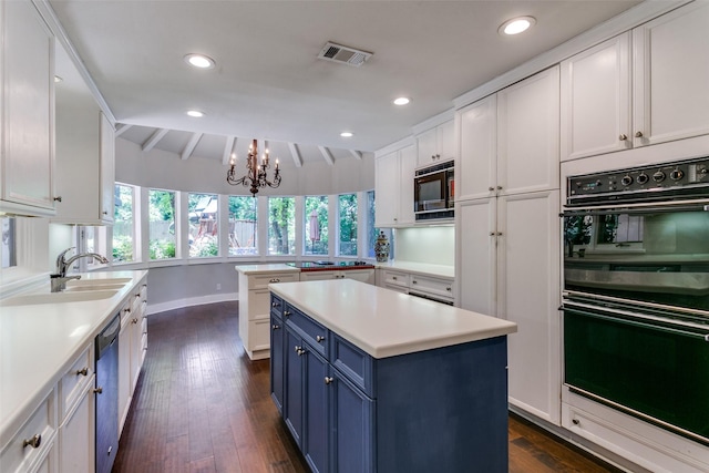 410 E Beady Rd, Arlington, TX 76006 - kitchen featuring blue cabinets, black appliances, white cabinets, light countertops, and a chandelier