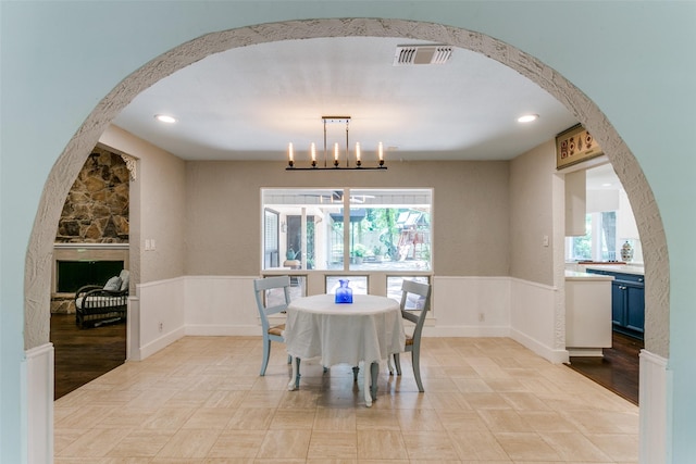 410 E Beady Rd, Arlington, TX 76006 - dining space with wainscoting and arched walkways