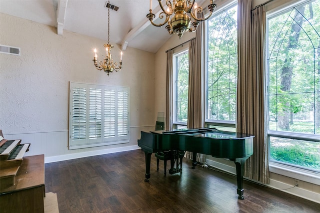 410 E Beady Rd, Arlington, TX 76006 - living area featuring a chandelier, a textured wall, and dark wood-type flooring