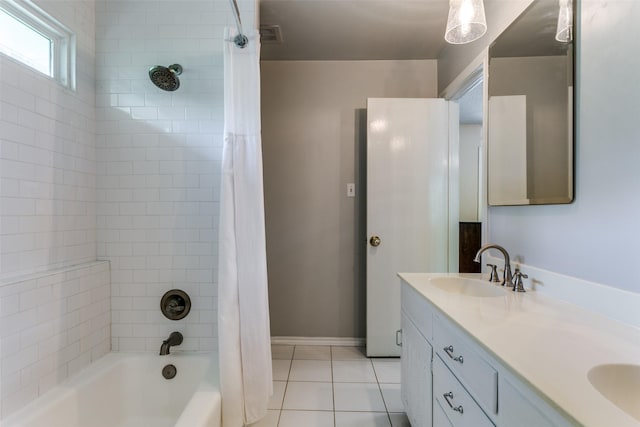410 E Beady Rd, Arlington, TX 76006 - full bathroom with tile patterned flooring, shower / bath combo, double vanity, and baseboards