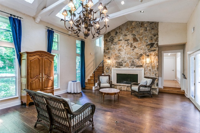 410 E Beady Rd, Arlington, TX 76006 - living area with healthy amount of natural light, wood finished floors, high vaulted ceiling, a chandelier, and stairs