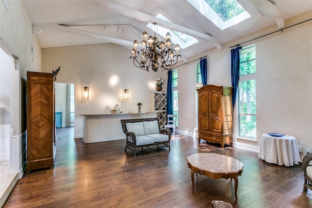 410 E Beady Rd, Arlington, TX 76006 - living area featuring a textured wall, a chandelier, a skylight, beamed ceiling, and high vaulted ceiling