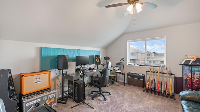 office featuring vaulted ceiling, a ceiling fan, carpet, and baseboards