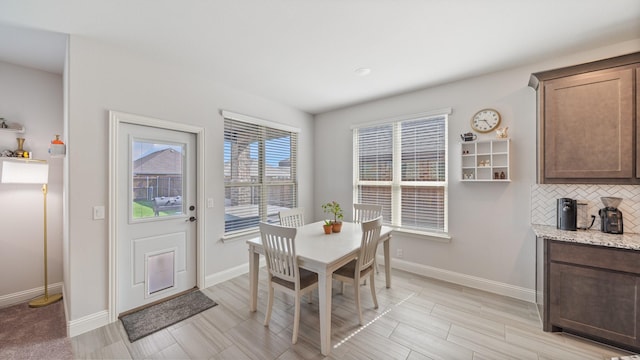 dining room with baseboards